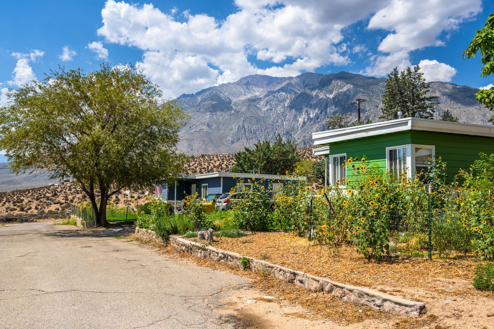 1600 Pine Creek Road Bishop, CA 93514 - Photo 13 of 34 a front view of a house with garden
