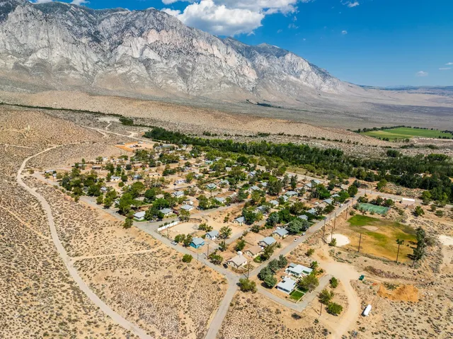 a view of beach and mountain