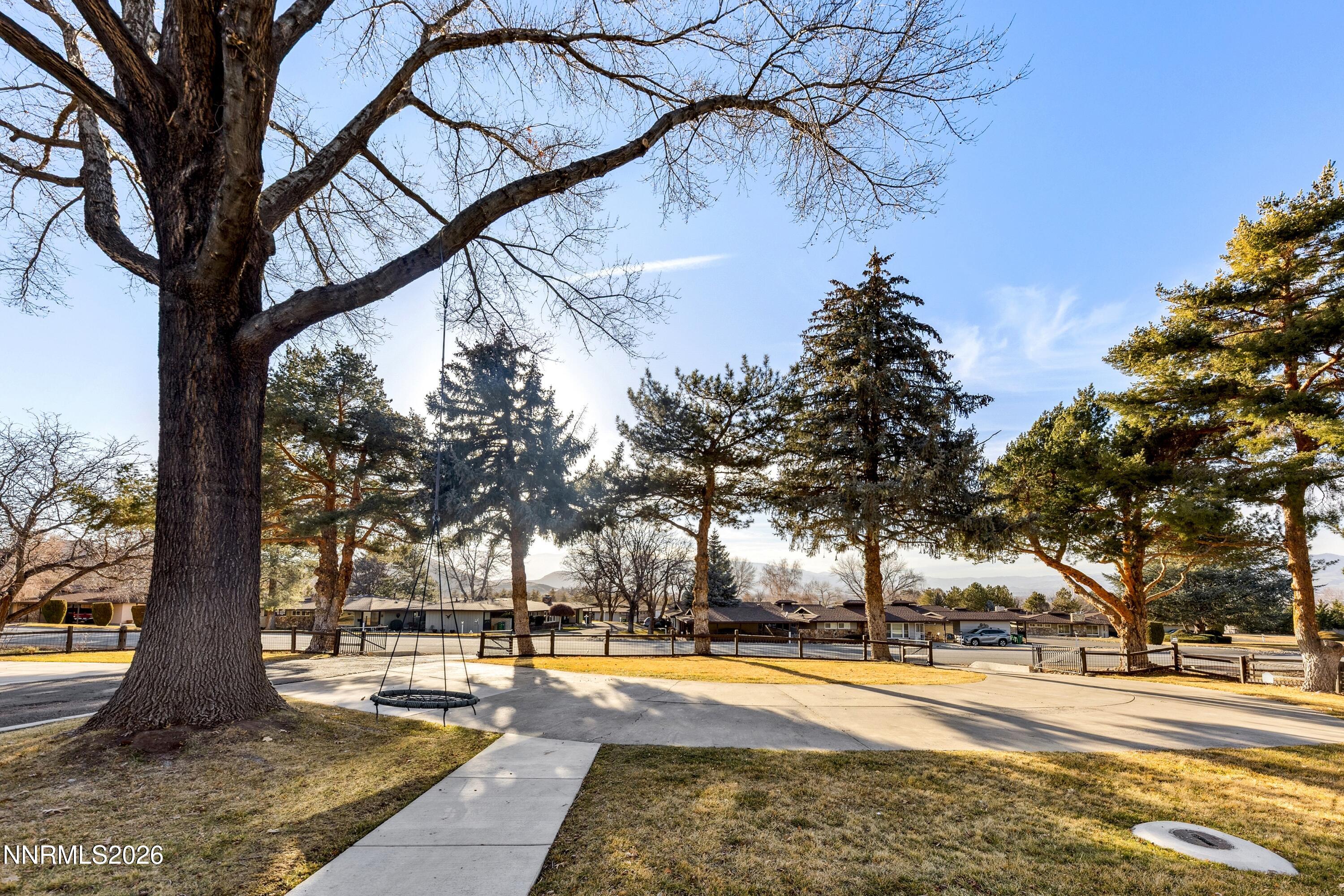 3620 East Hidden Valley Drive Reno, NV 89502 - Photo 16 of 67 a view of a yard with trees