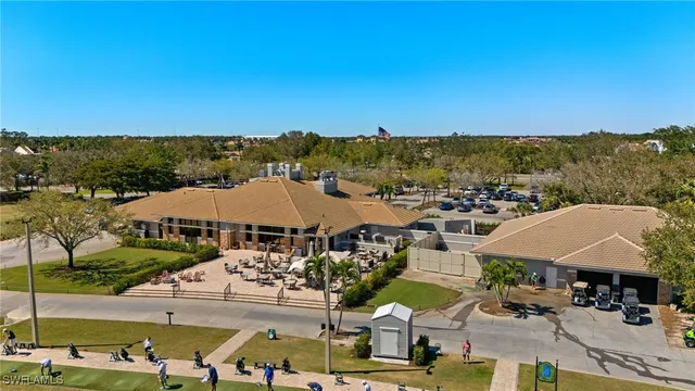 a view of multiple houses with a big yard
