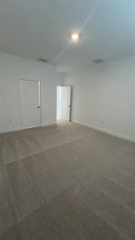 a bathroom with a shower and a toilet