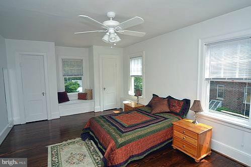 2311 Forest Glen Road Silver Spring, MD 20910 - Photo 2 of 28 a bedroom with a bed and window