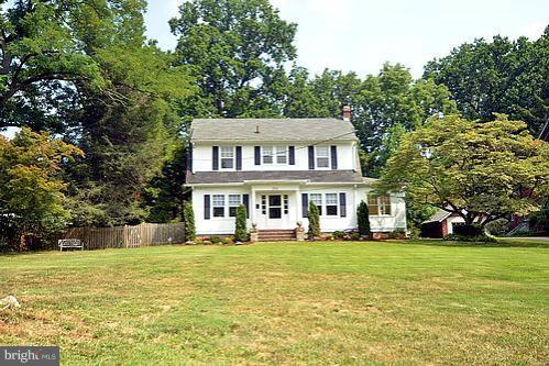 2311 Forest Glen Road Silver Spring, MD 20910 - Photo 12 of 28 a front view of a house with a yard