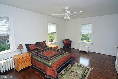 2311 Forest Glen Road Silver Spring, MD 20910 - Photo 22 of 28 a living room with furniture and a window