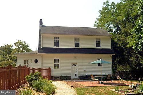 2311 Forest Glen Road Silver Spring, MD 20910 - Photo 25 of 28 a front view of a house with a yard