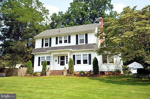2311 Forest Glen Road Silver Spring, MD 20910 - Photo 26 of 28 a front view of a house with a garden