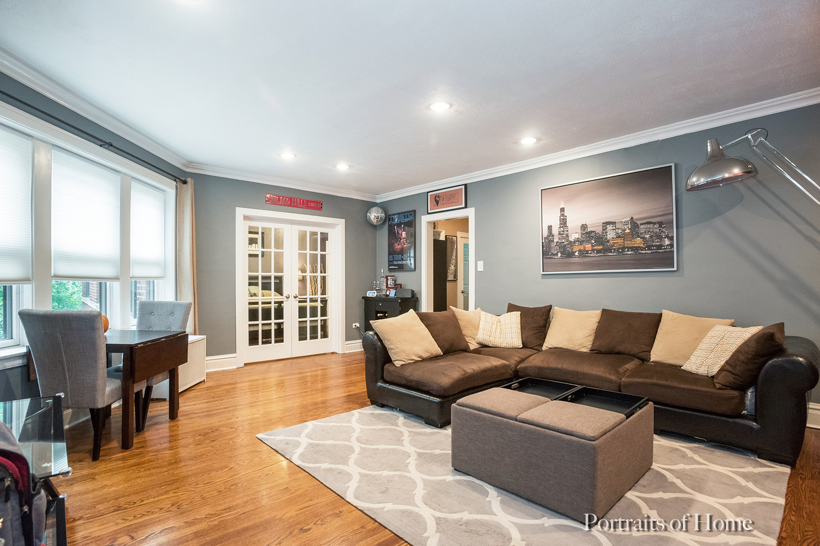 530 Sheridan Road, Unit 2A Evanston, IL 60202 - Photo 2 of 11 a living room with furniture and floor to ceiling windows