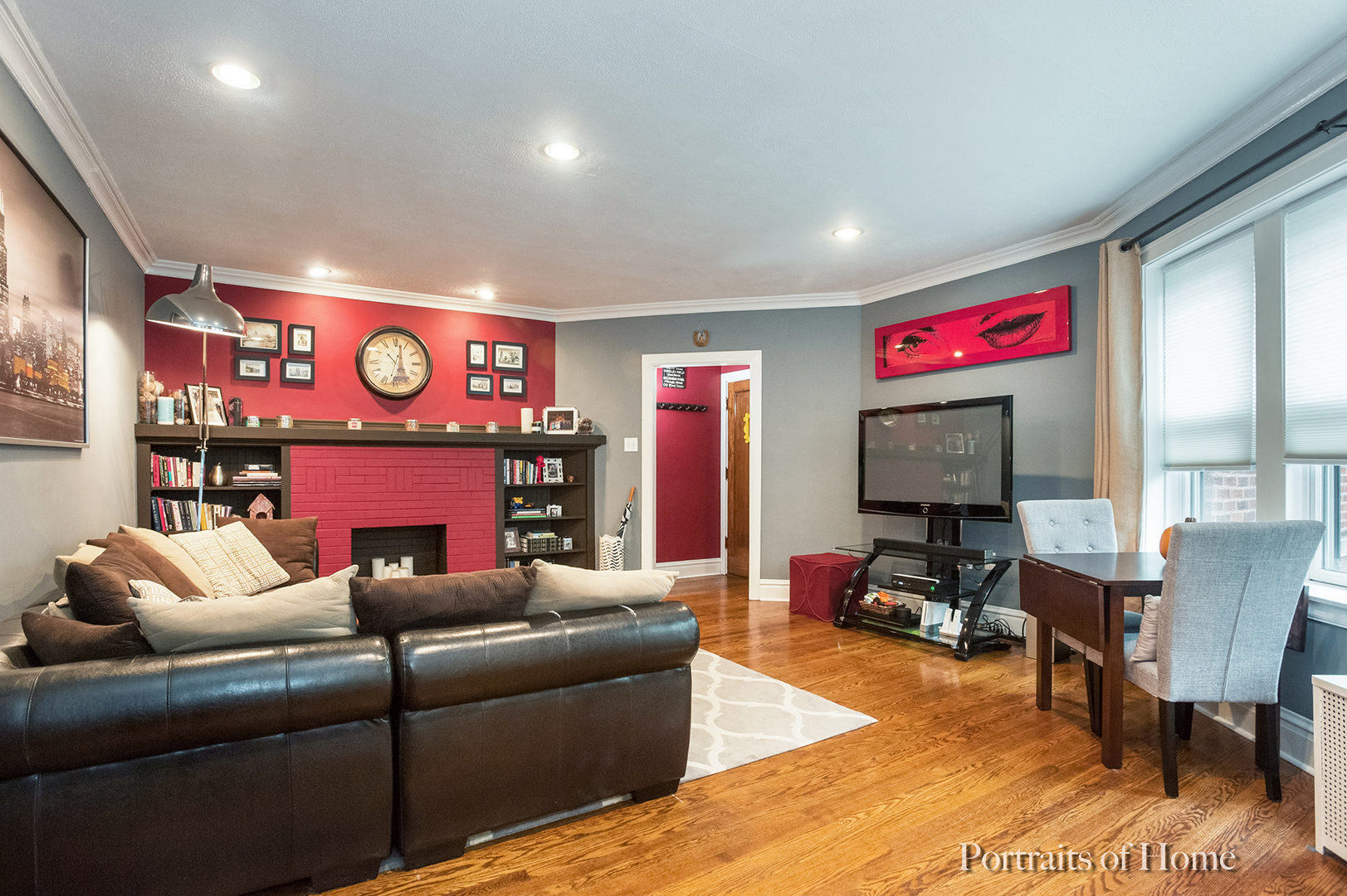 530 Sheridan Road, Unit 2A Evanston, IL 60202 - Photo 3 of 11 a living room with furniture a flat screen tv and a fireplace