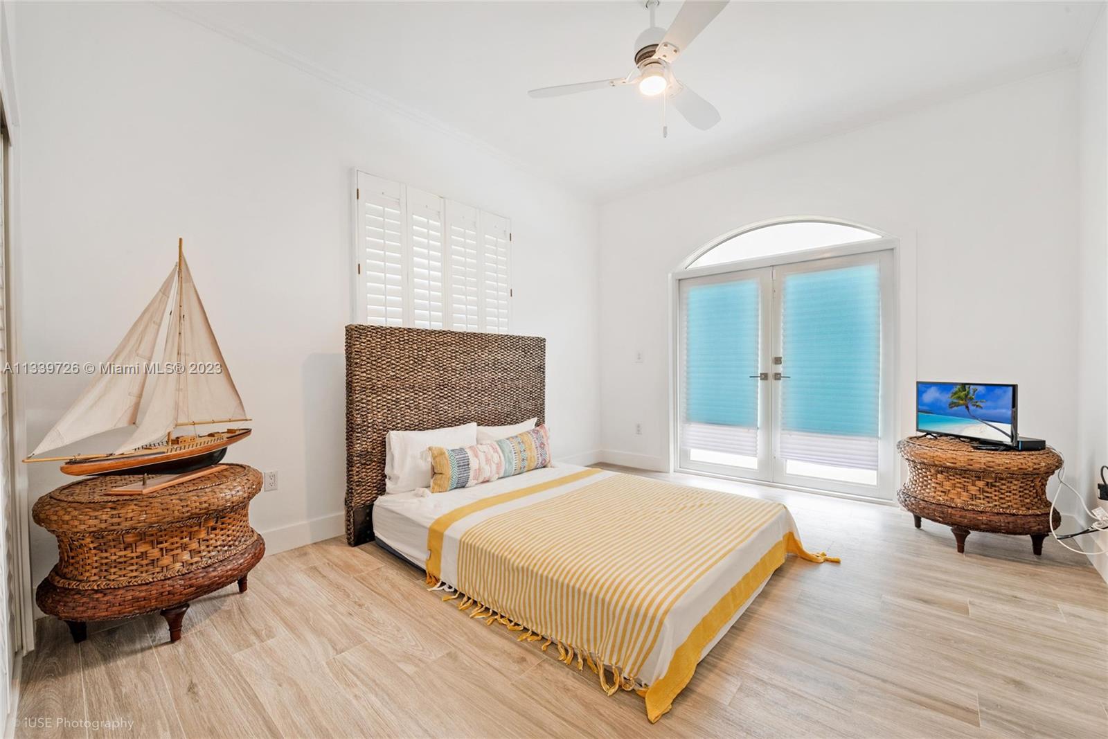 8528 Southwest 121st Street Miami, FL 33156 - Photo 17 of 26 a bedroom with a bed and a chair