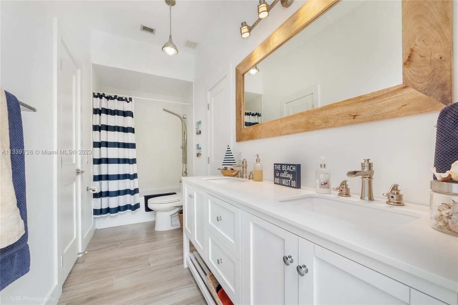 8528 Southwest 121st Street Miami, FL 33156 - Photo 18 of 26 a bathroom with a sink a toilet and shower