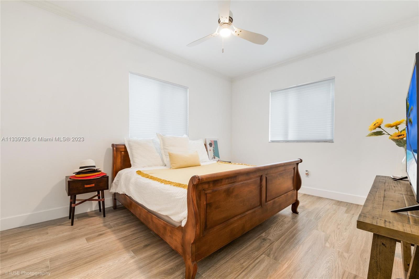 8528 Southwest 121st Street Miami, FL 33156 - Photo 21 of 26 a room with a bed and a wooden floor