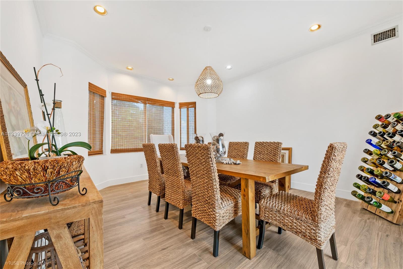 8528 Southwest 121st Street Miami, FL 33156 - Photo 6 of 26 a view of a dining room with furniture window and wooden floor