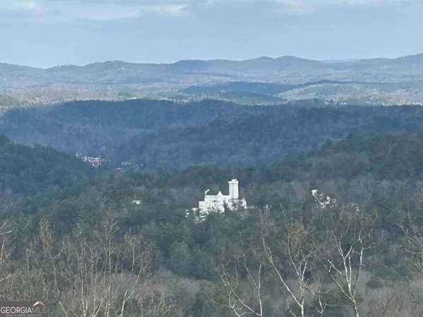 a view of a outdoor space with mountain view