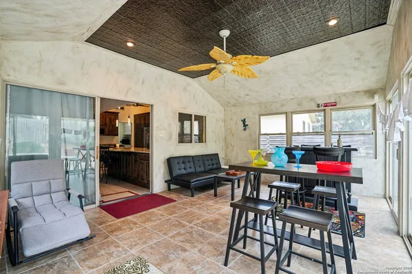 a view of a livingroom with furniture and a table