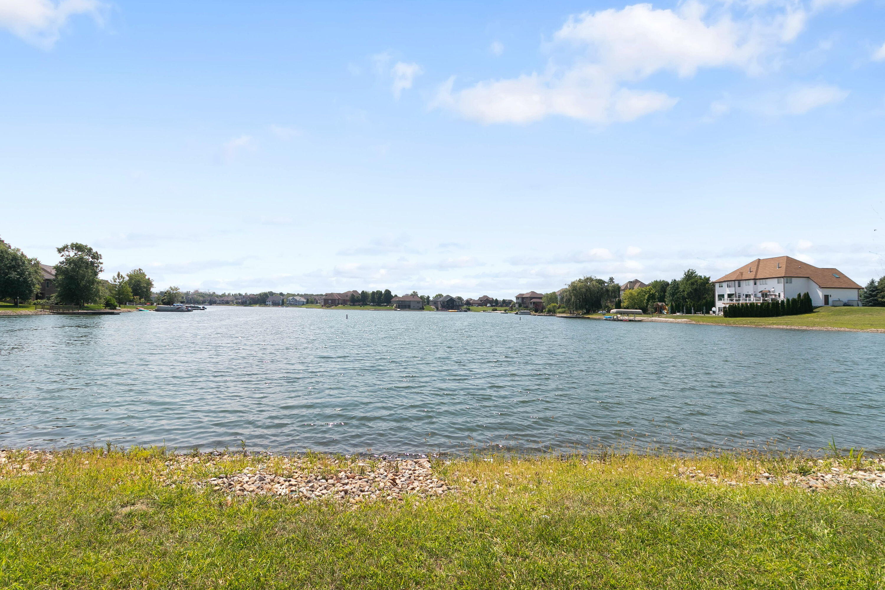 8703 Bridgewater Court Crown Point, IN 46307 - Photo 16 of 26 a view of a lake view