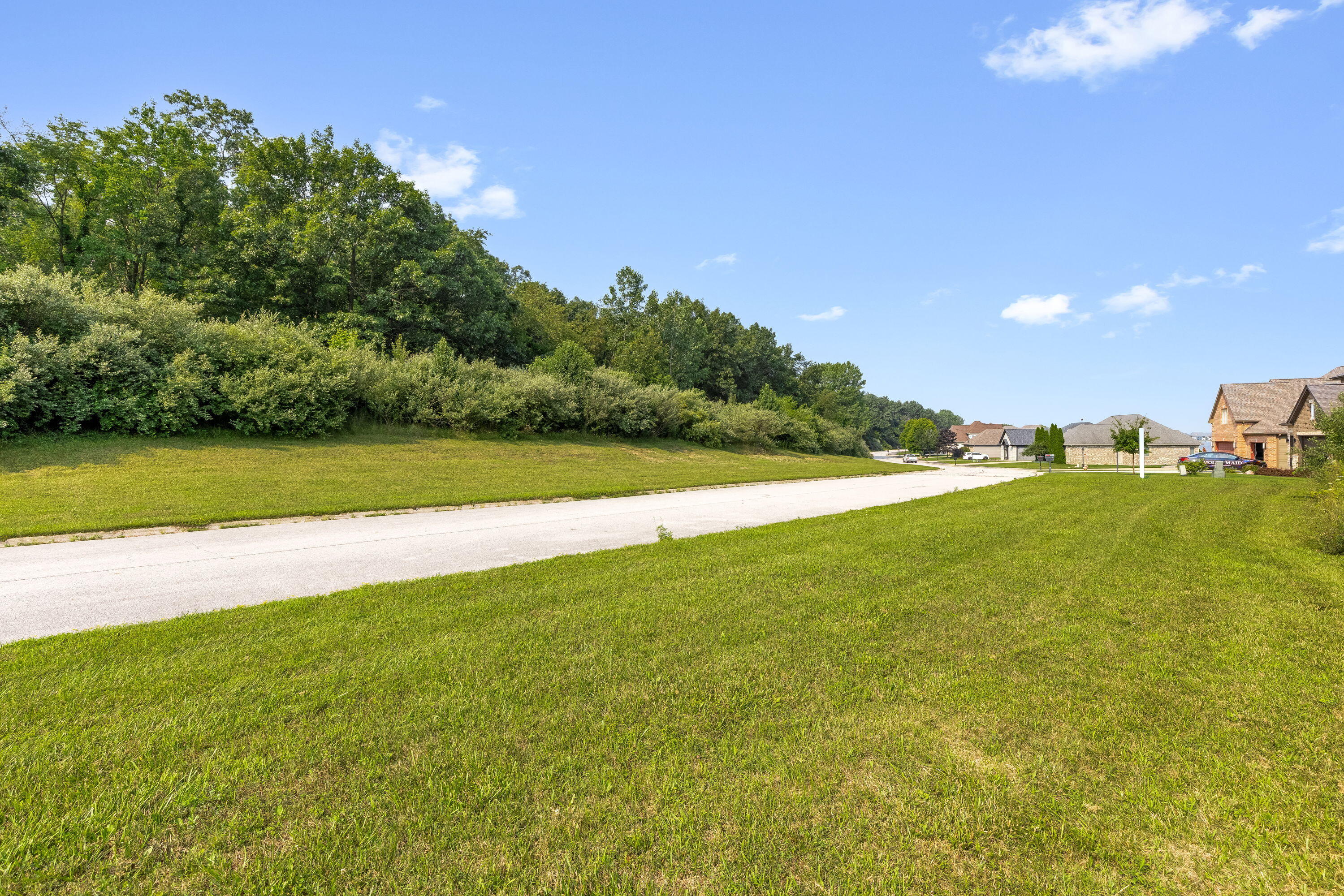 8703 Bridgewater Court Crown Point, IN 46307 - Photo 19 of 26 a view of a green field with clear sky