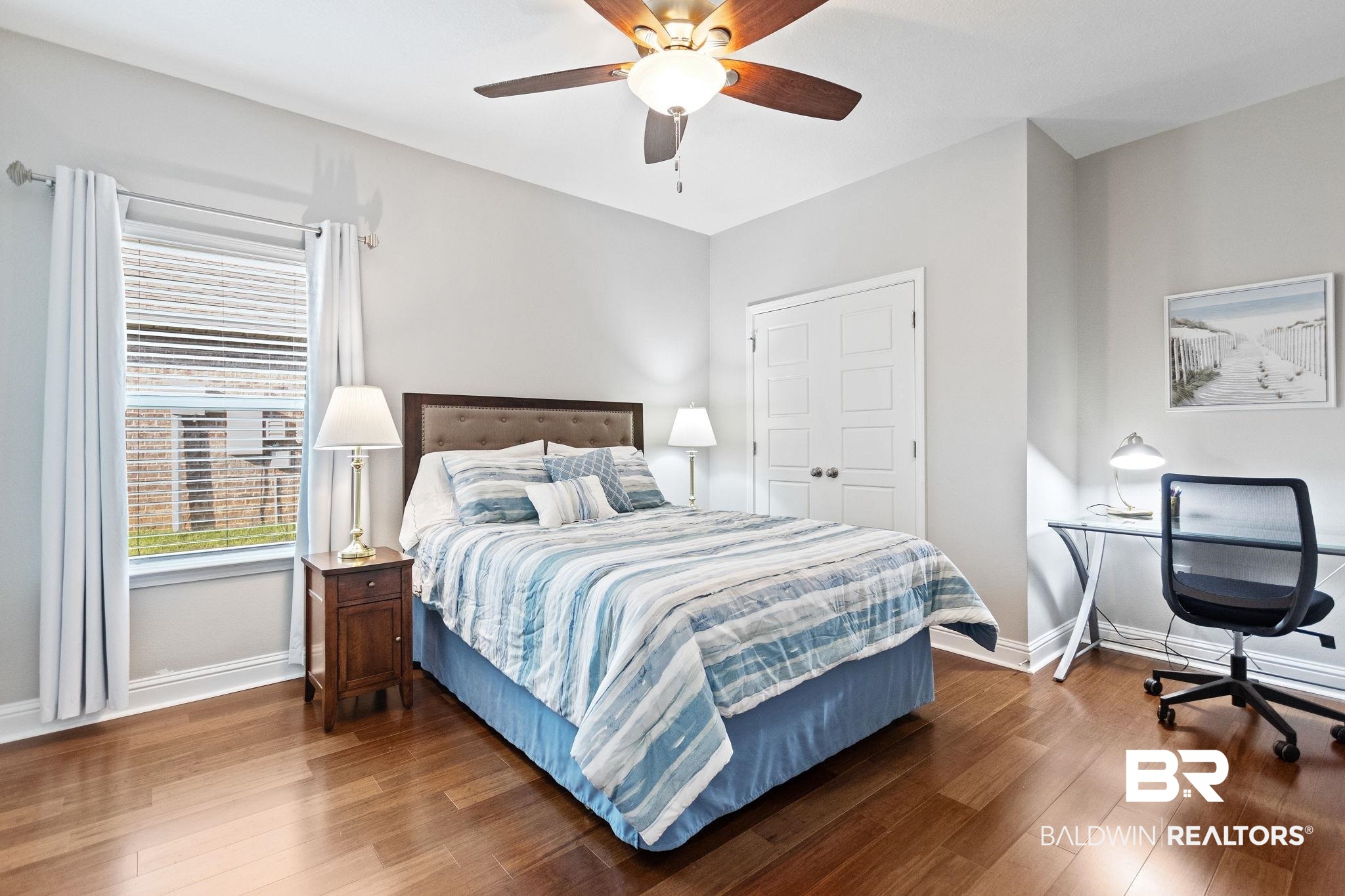 31541 Hoot Owl Road Daphne, AL 36527 - Photo 28 of 51 Bedroom featuring hardwood / wood-style flooring and ceiling fan