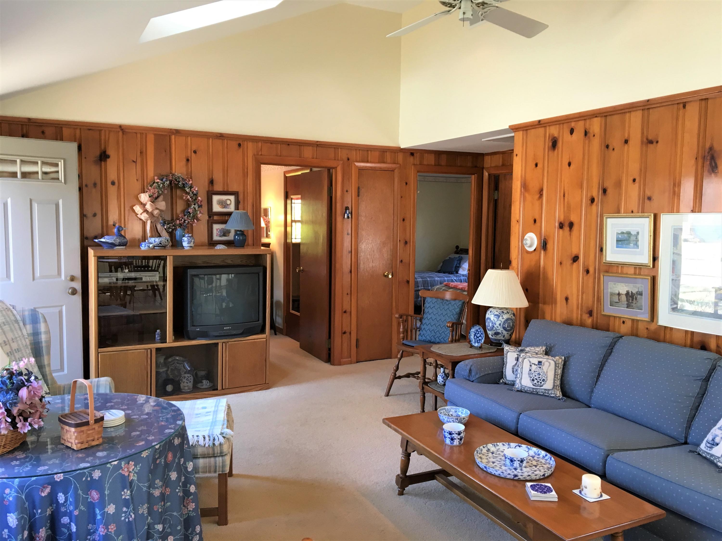 84 Uncle Edwards Road Mashpee, MA 02649 - Photo 13 of 22 a living room with furniture and wooden floor