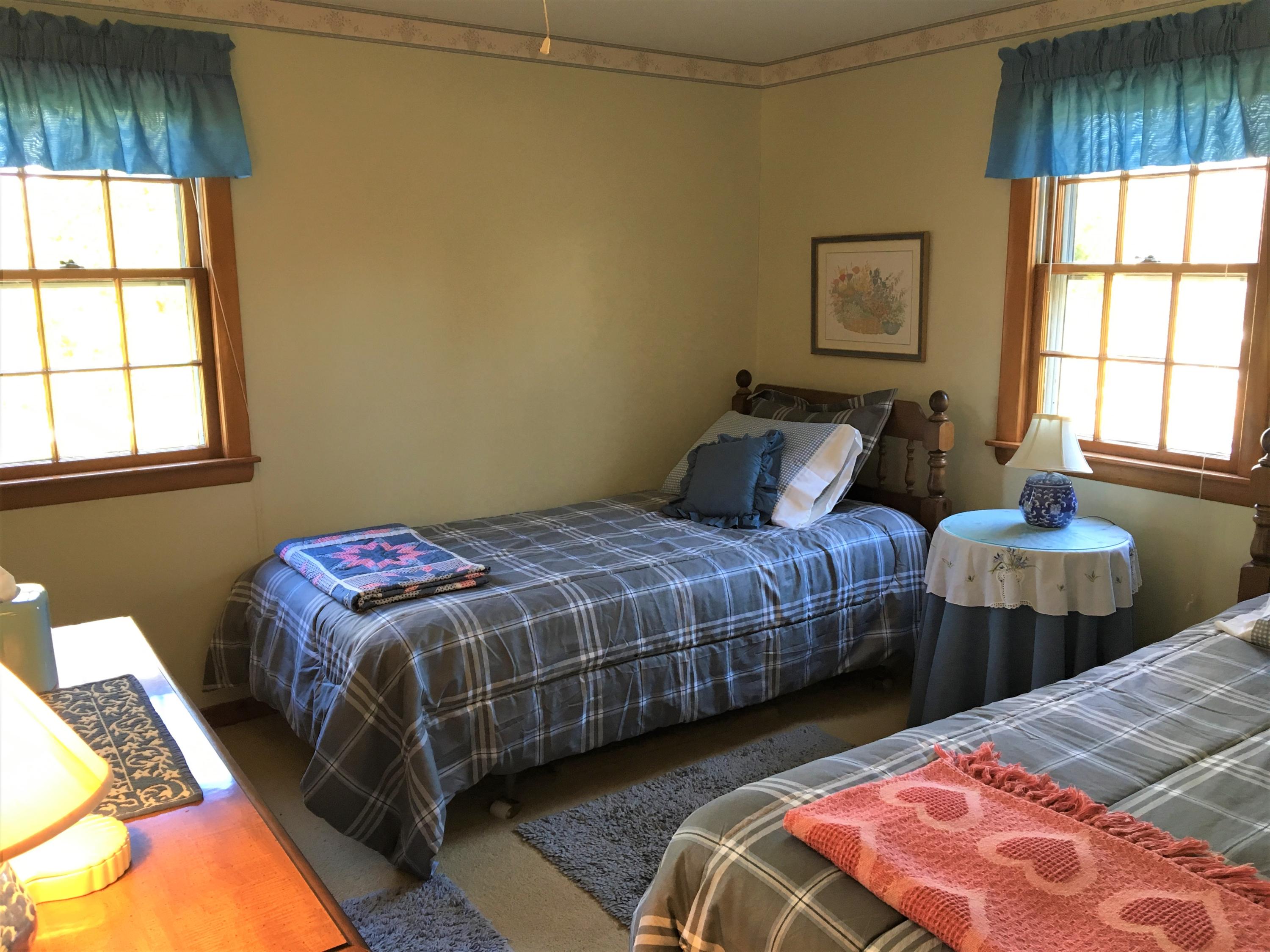 84 Uncle Edwards Road Mashpee, MA 02649 - Photo 15 of 22 a bedroom with two beds and a window
