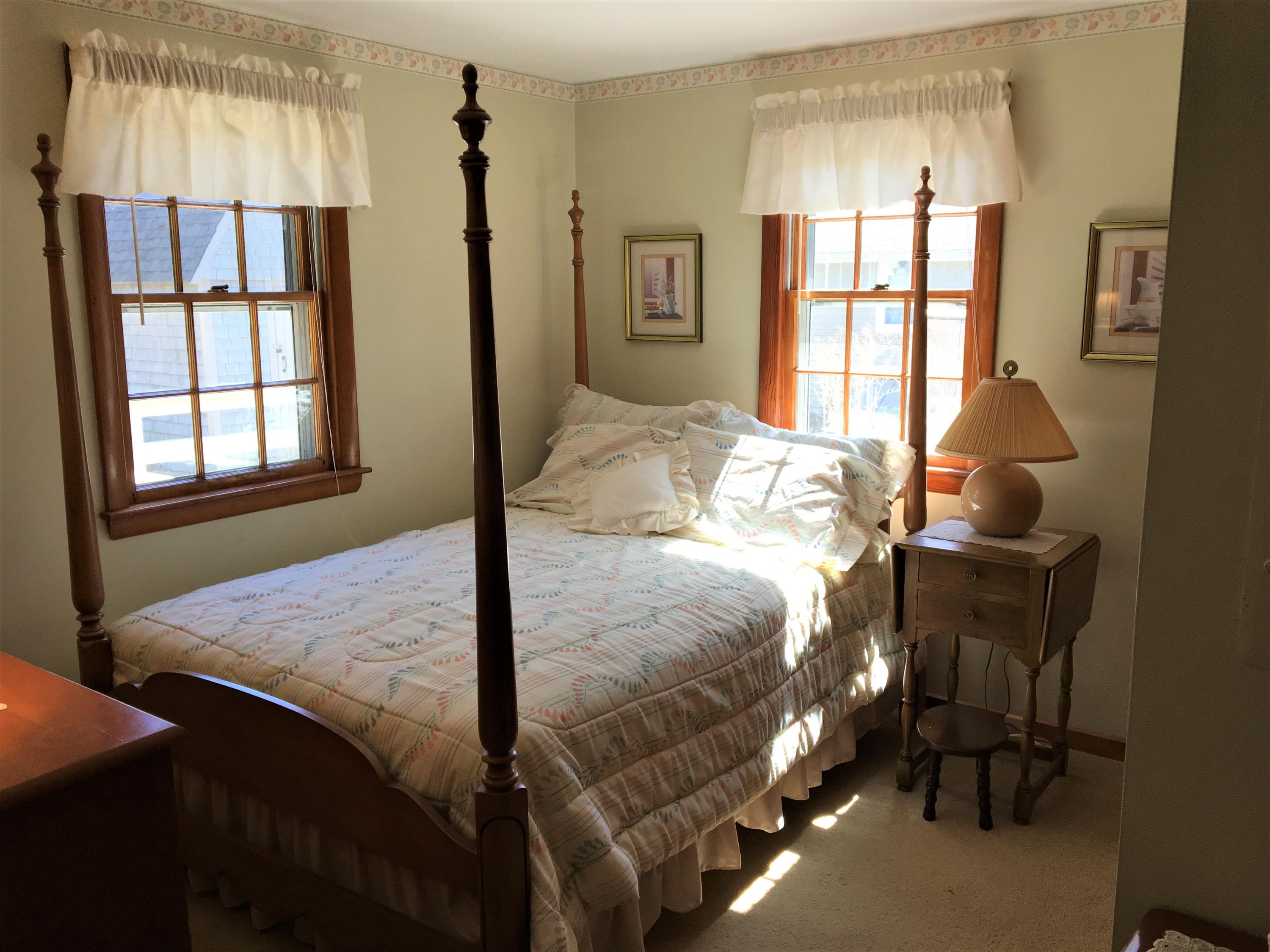84 Uncle Edwards Road Mashpee, MA 02649 - Photo 17 of 22 a bedroom with a bed and a window