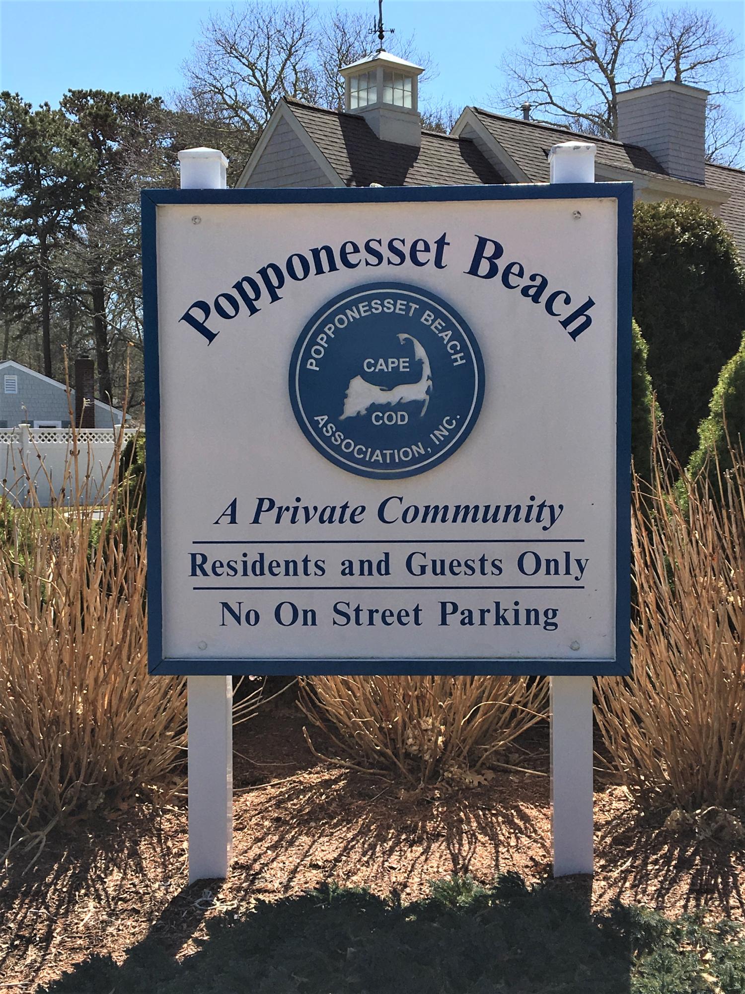 84 Uncle Edwards Road Mashpee, MA 02649 - Photo 18 of 22 a sign on the side of a building