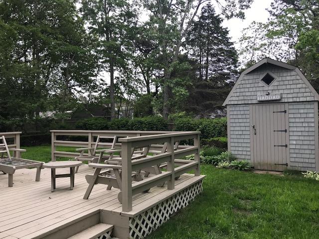 84 Uncle Edwards Road Mashpee, MA 02649 - Photo 4 of 22 a view of house with deck and outdoor seating