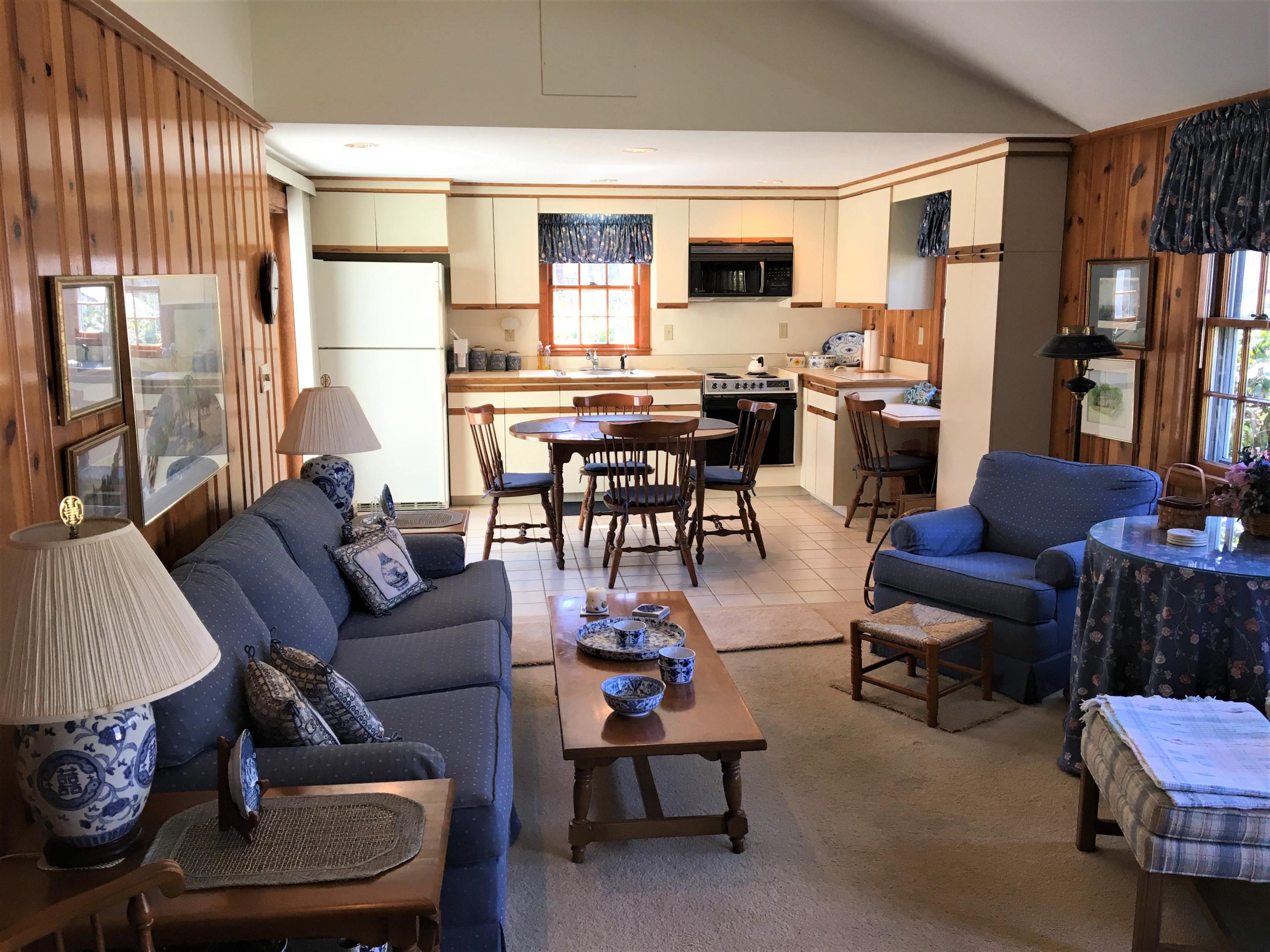 84 Uncle Edwards Road Mashpee, MA 02649 - Photo 7 of 22 a living room with furniture and large windows