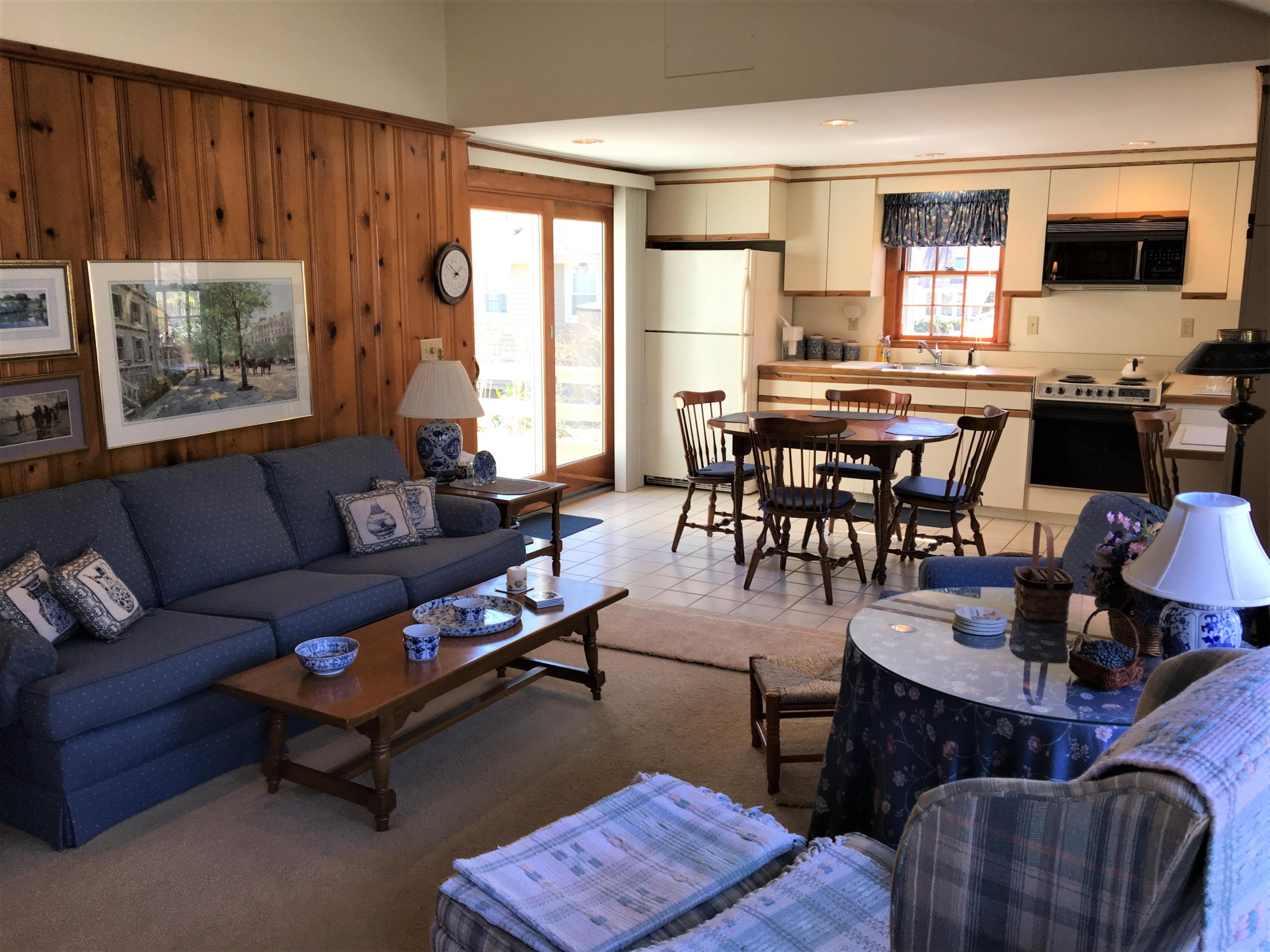 84 Uncle Edwards Road Mashpee, MA 02649 - Photo 8 of 22 a living room with furniture a flat screen tv and a window