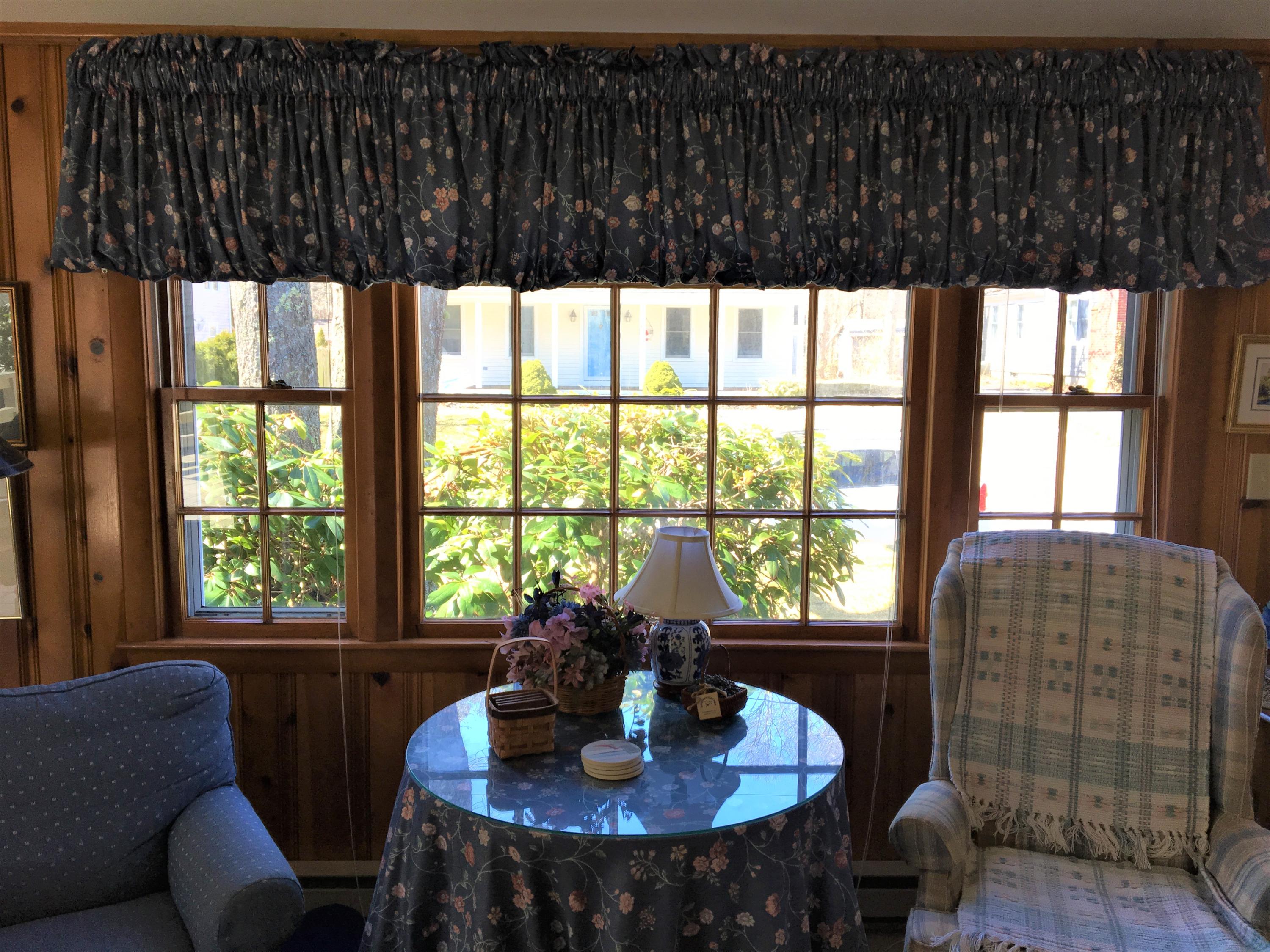 84 Uncle Edwards Road Mashpee, MA 02649 - Photo 9 of 22 a view of a dining room with furniture window and outside view
