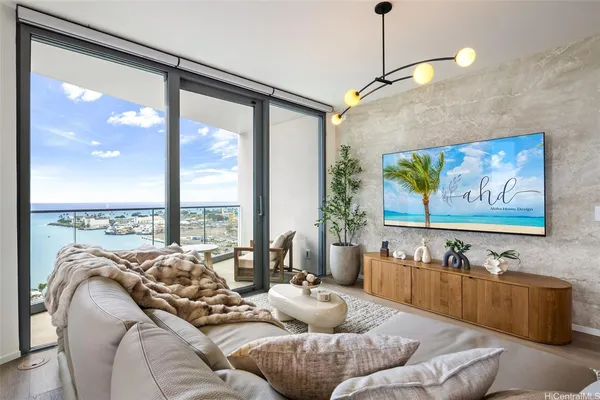 a living room with furniture and a large window