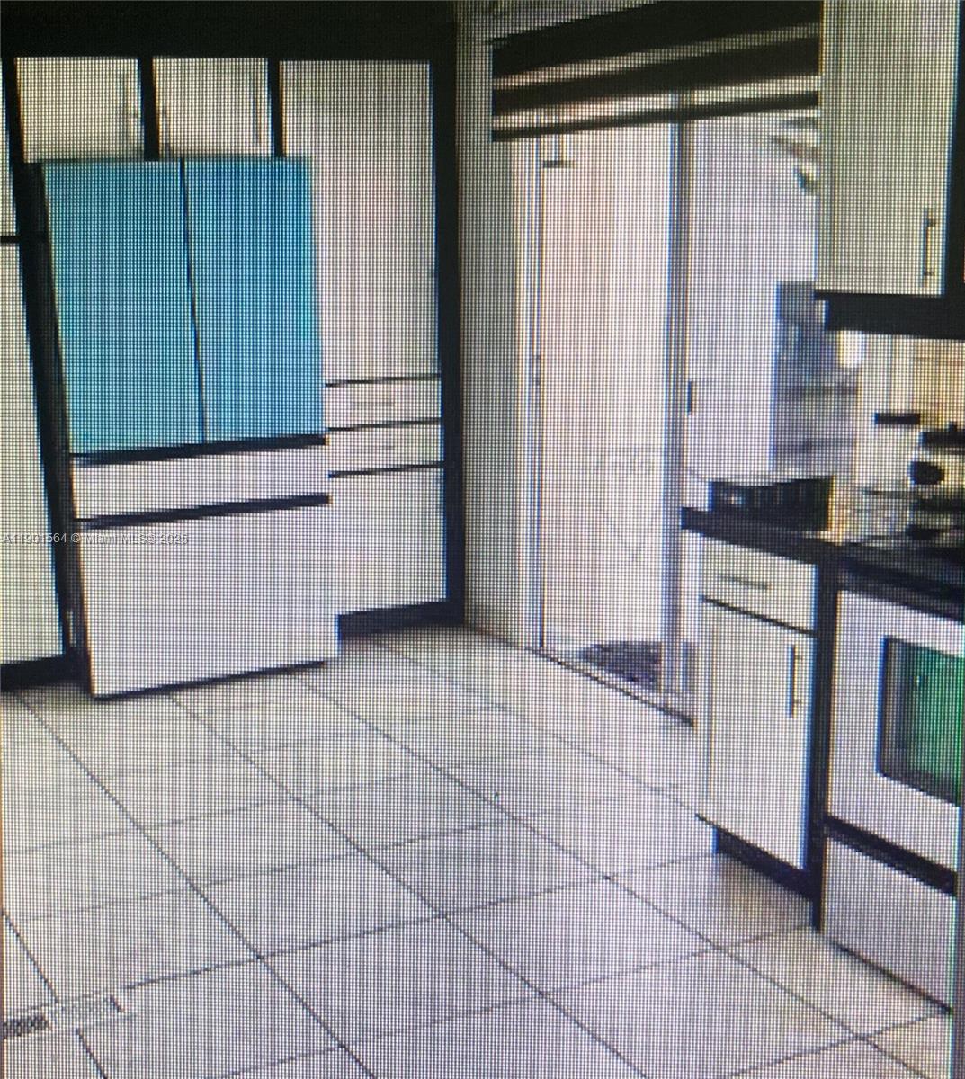 1891 Southwest 84th Avenue Davie, FL 33324 - Photo 8 of 16 a kitchen with a cabinets and white appliances