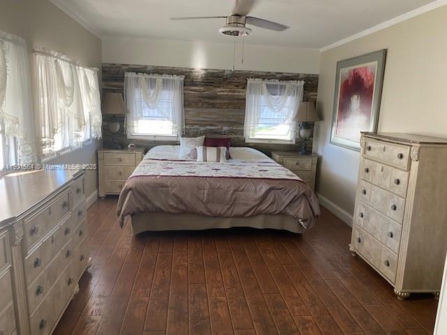 1891 Southwest 84th Avenue Davie, FL 33324 - Photo 10 of 16 a bedroom with a bed and a dresser
