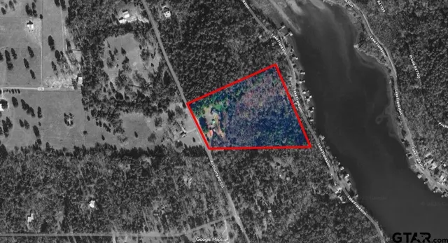 a view of balcony with wooden floor