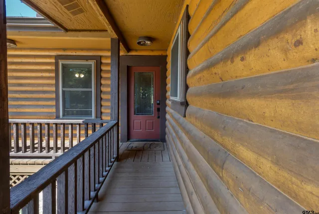 a view of a kitchen from the hallway