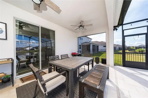 a view of a swimming pool with a porch