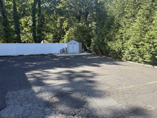 a view of backyard with green space