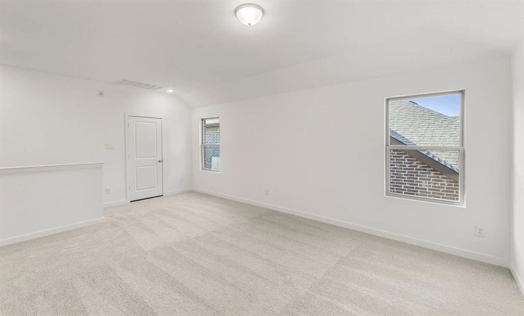 1008 Colgate Circle Princeton, TX 75407 - Photo 24 of 29 an empty room with windows