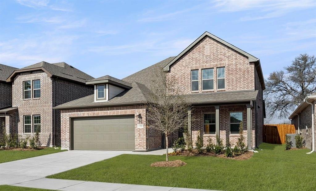 1008 Colgate Circle Princeton, TX 75407 - Photo 3 of 29 a front view of a house with a yard