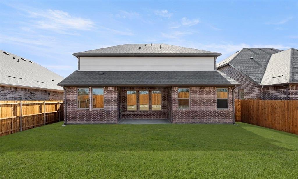 1008 Colgate Circle Princeton, TX 75407 - Photo 6 of 29 a front view of a house with a garden
