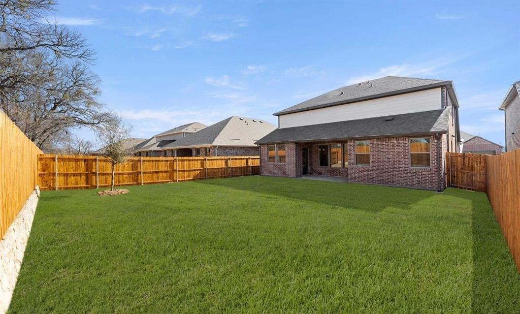 1008 Colgate Circle Princeton, TX 75407 - Photo 7 of 29 a view of a yard in front of a house