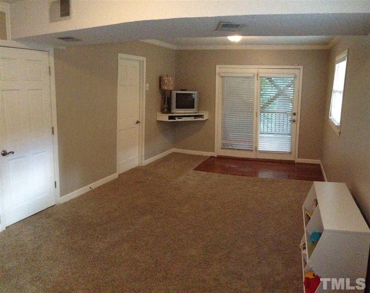 2109 Hillock Drive Raleigh, NC 27612 - Photo 17 of 23 a view of livingroom with kitchen