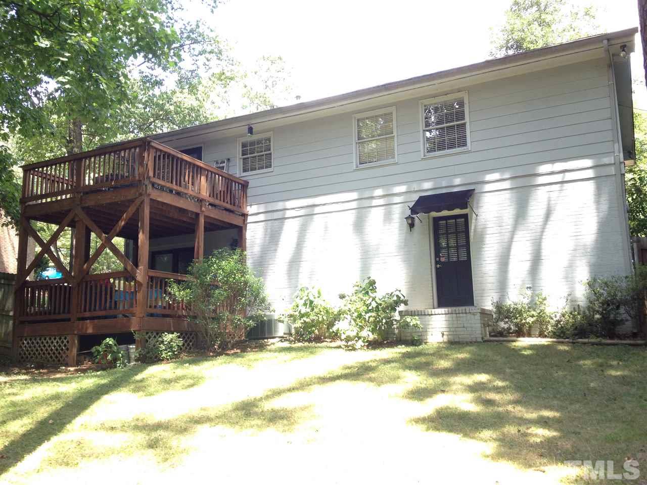 2109 Hillock Drive Raleigh, NC 27612 - Photo 20 of 23 a front view of a house with a yard