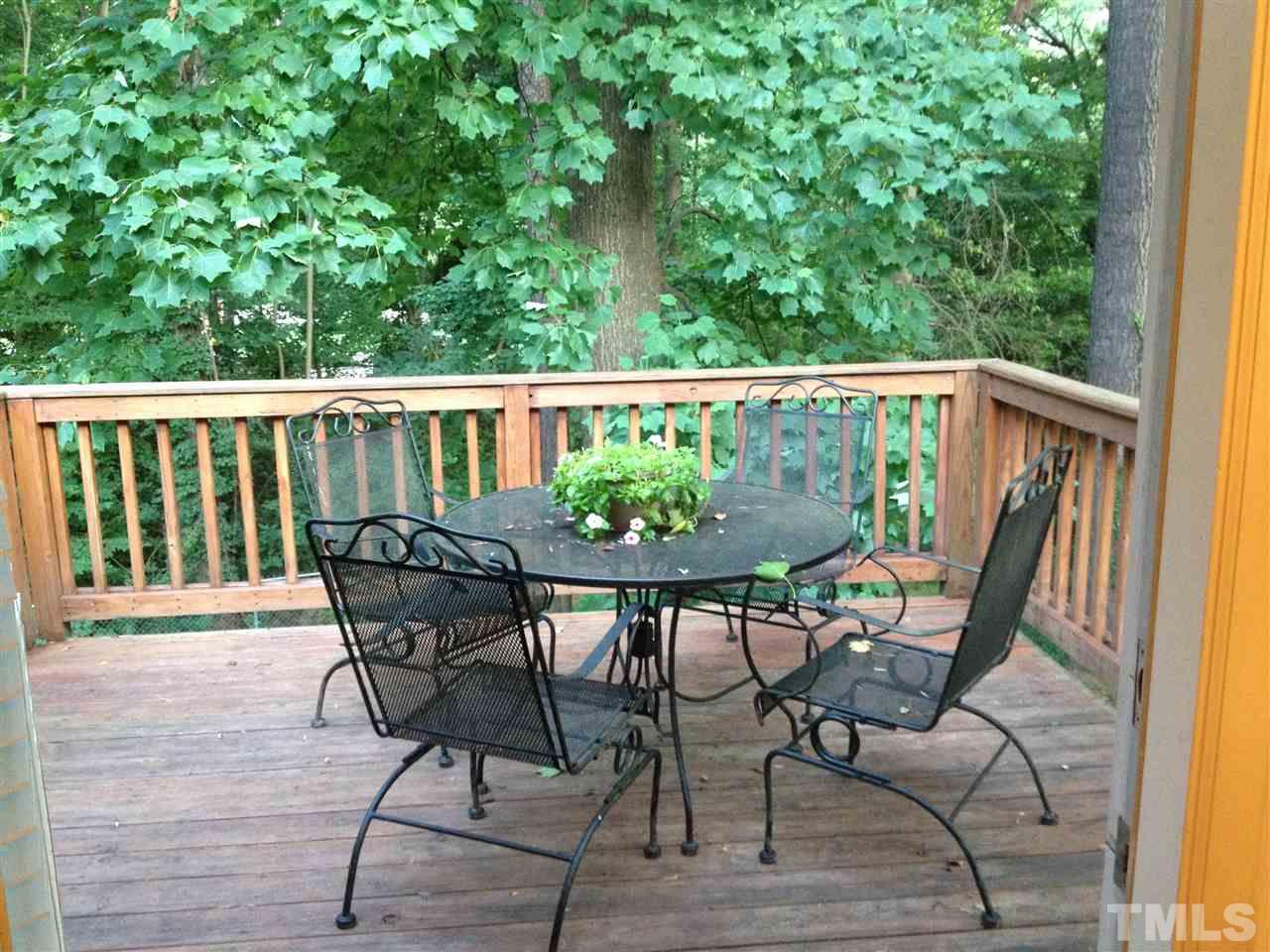 2109 Hillock Drive Raleigh, NC 27612 - Photo 21 of 23 a view of a chair and table in the balcony