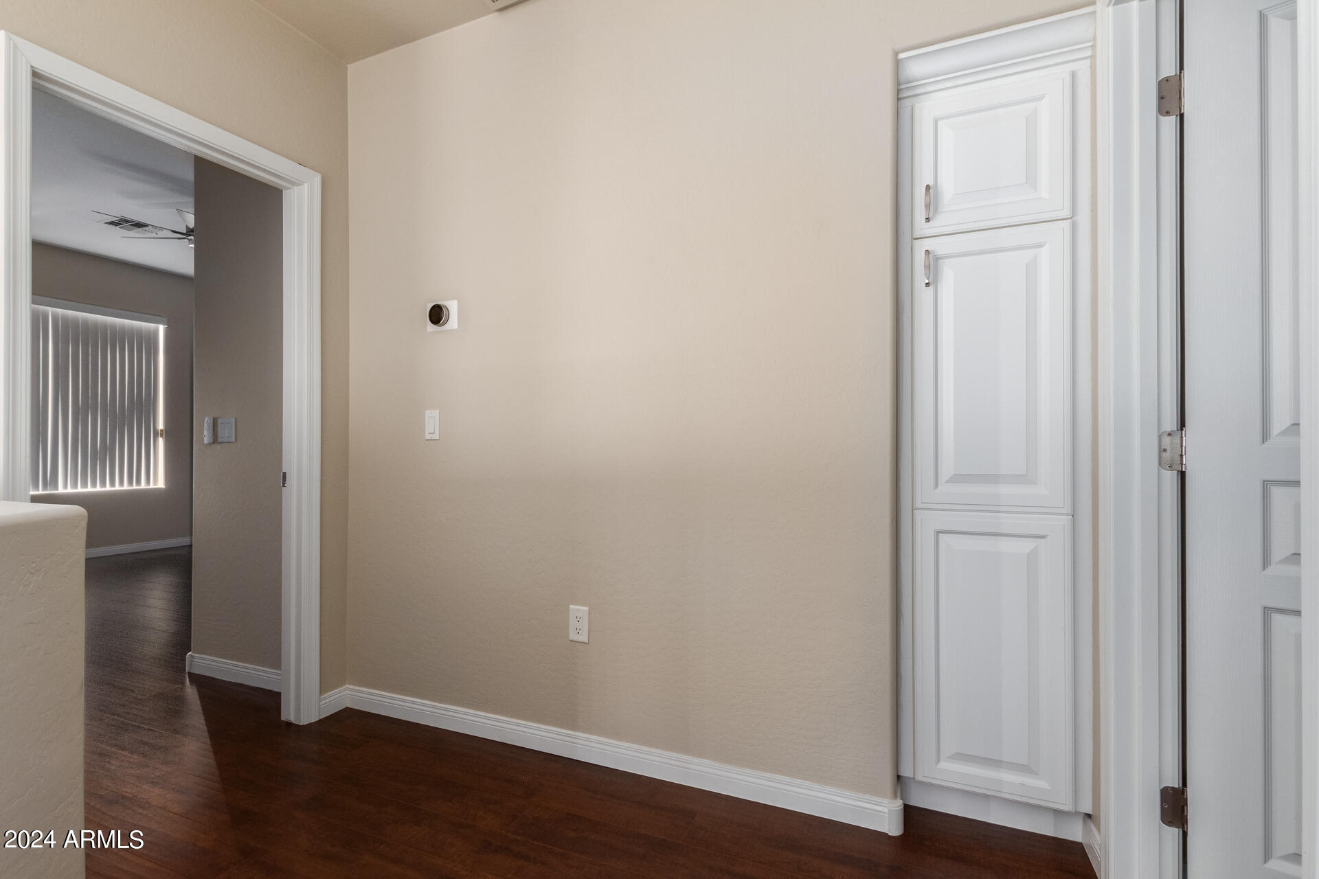19475 North Grayhawk Drive, Unit 1100 Scottsdale, AZ 85255 - Photo 28 of 54 an empty room with wooden floor & closet area