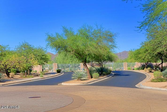 19475 North Grayhawk Drive, Unit 1100 Scottsdale, AZ 85255 - Photo 42 of 54 a view of a street with houses on both side