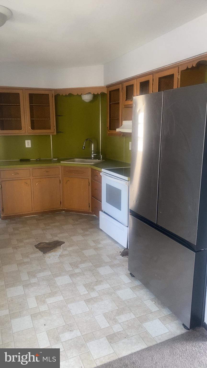 307 Burlington Avenue Delanco, NJ 08075 - Photo 3 of 6 a view of kitchen with refrigerator and window