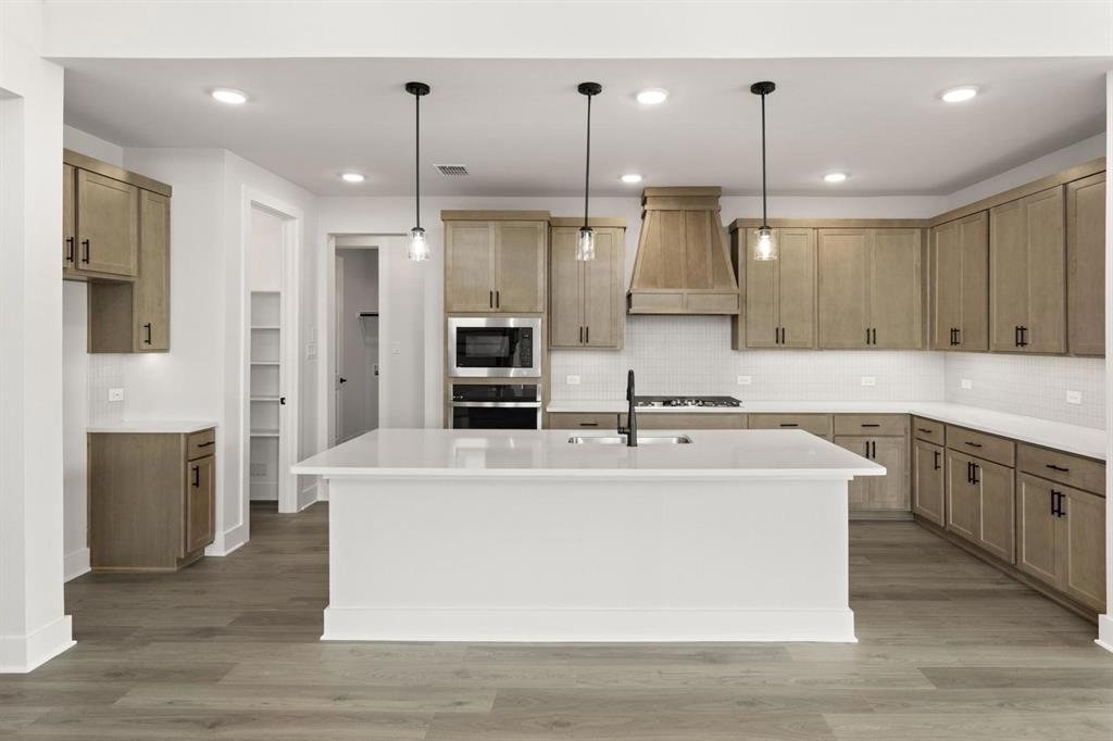 7228 Ladybug Lane Aubrey, TX 76227 - Photo 3 of 27 9_10. 7228 Ladybug - Kitchen