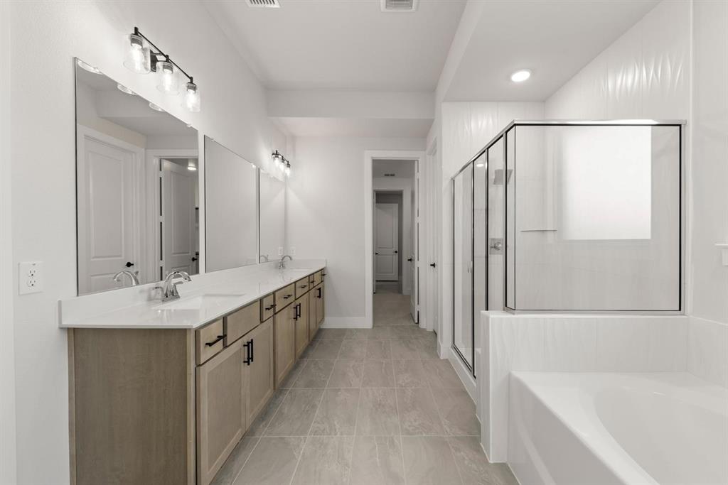 7228 Ladybug Lane Aubrey, TX 76227 - Photo 9 of 27 15_16. 7228 Ladybug - Bath