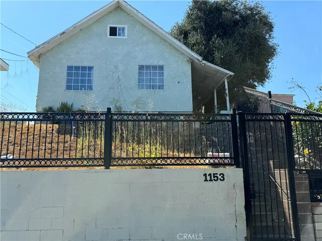 a view of a house with a swimming pool