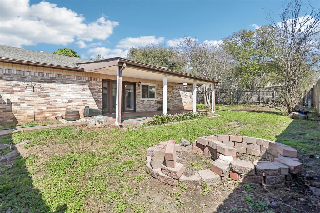 3216 Red Oak Lane Bedford, TX 76021 - Photo 37 of 40 front view of a house with a yard